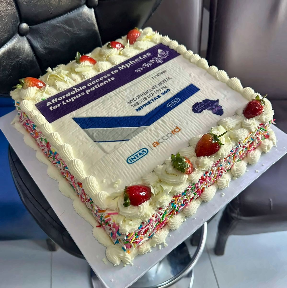 A cake reading Affordable access to Mphetas for lupus patients, with Intas, Accord and LFA branding