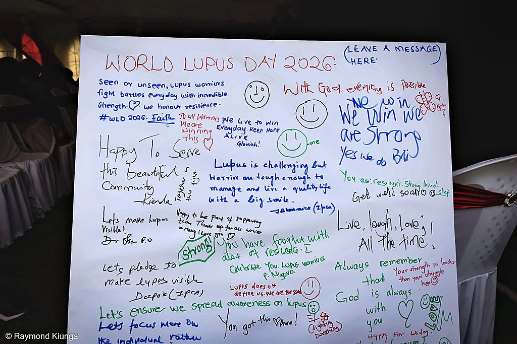The World Lupus Day 2026 pledge wall covered in handwritten messages of hope from the community