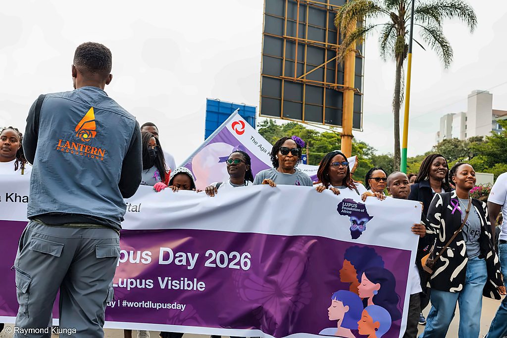 The community walking behind the Make Lupus Visible banner