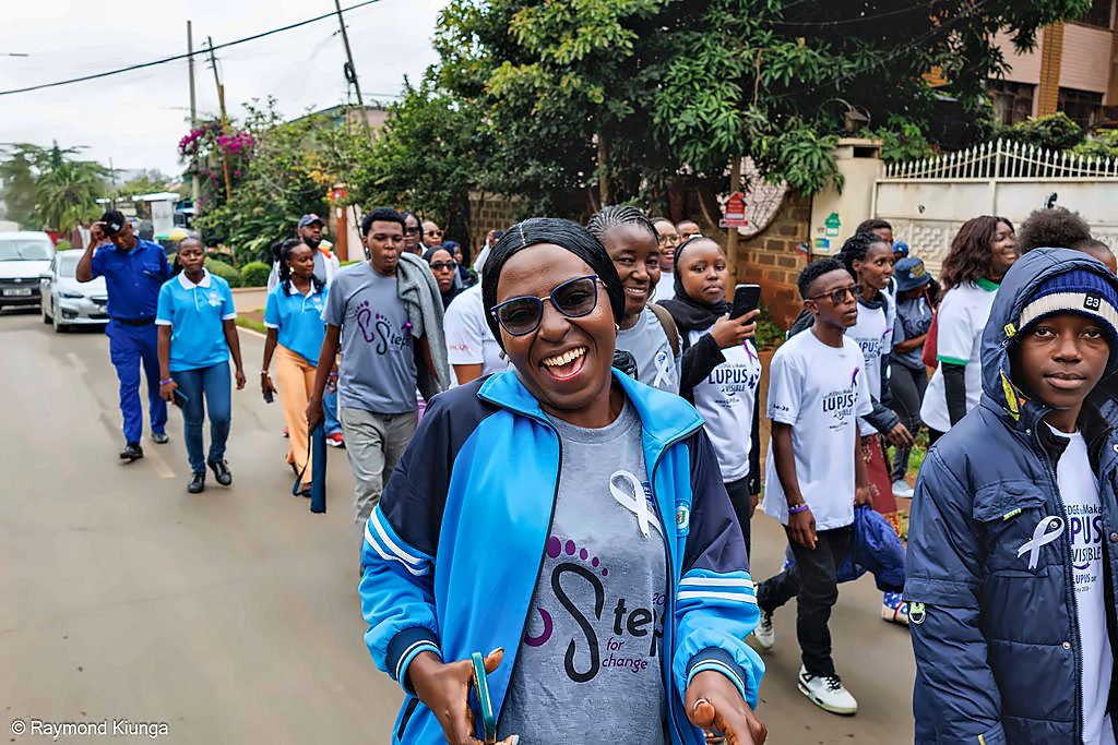 The walk moving through Nairobi in purple and white