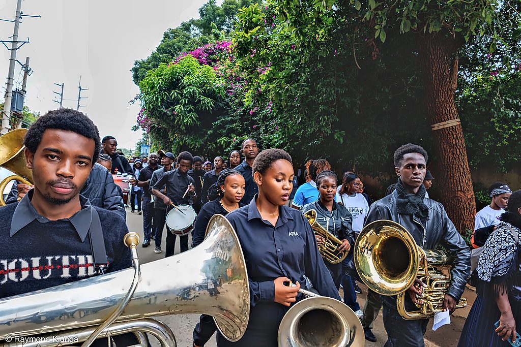 Musicians playing as the walk moves through the city