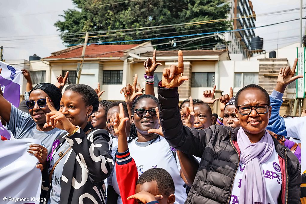 Hands raised in solidarity at World Lupus Day
