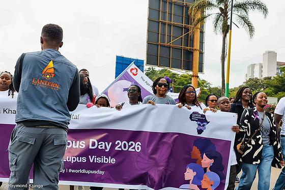 The community walking behind the Make Lupus Visible banner