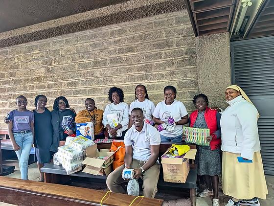 LFA members with donated toiletries and supplies during a KNH rheumatology ward visit